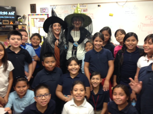Ellen Dean, BookPALS Director and Marilyn Sollenberger, BookPAL, show off their witch costumes.